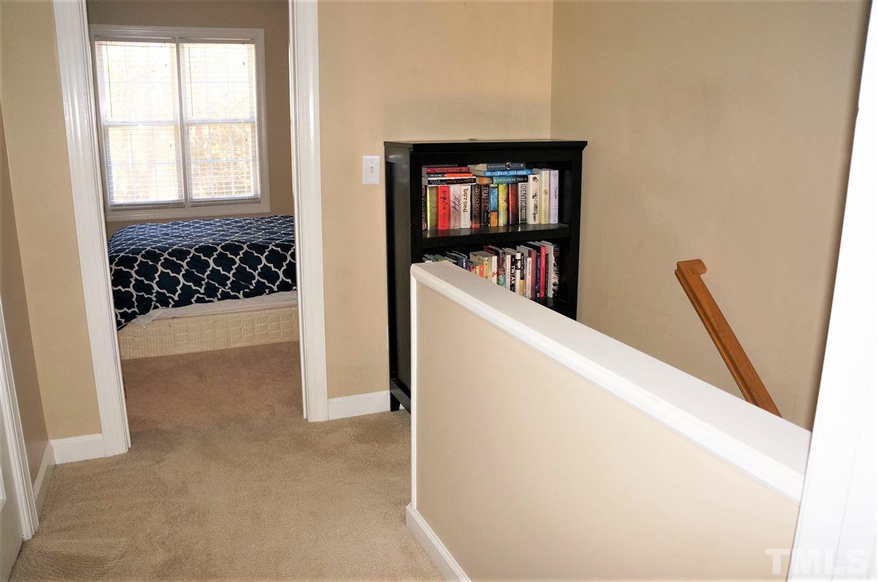 9204 Grassington Way Raleigh, NC 27615 - Photo 15 of 29 a view of a living room with windows