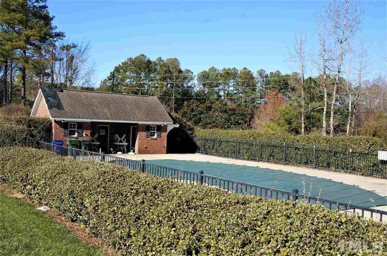 9204 Grassington Way Raleigh, NC 27615 - Photo 29 of 29 a view of a house with a yard and sitting area