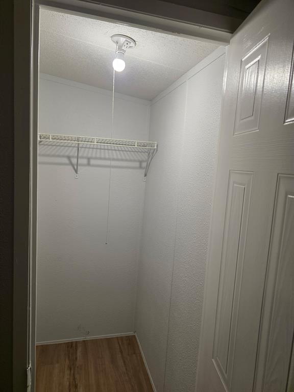 115 Yates Circle Aledo, TX 76008 - Photo 19 of 31 a view of a room with racks on the wall