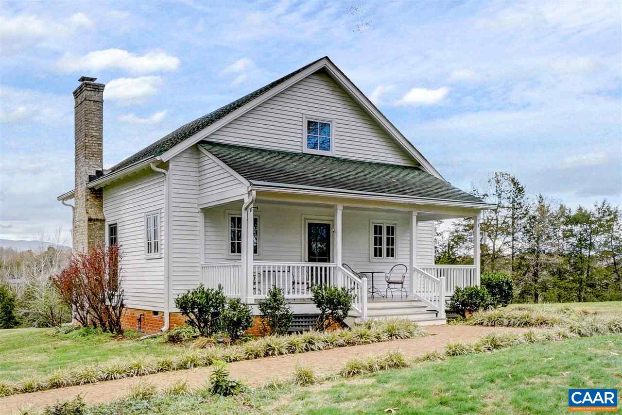 5120 Rutherford Road Free Union, VA 22901 - Photo 4 of 39 a front view of a house with a yard and potted plants