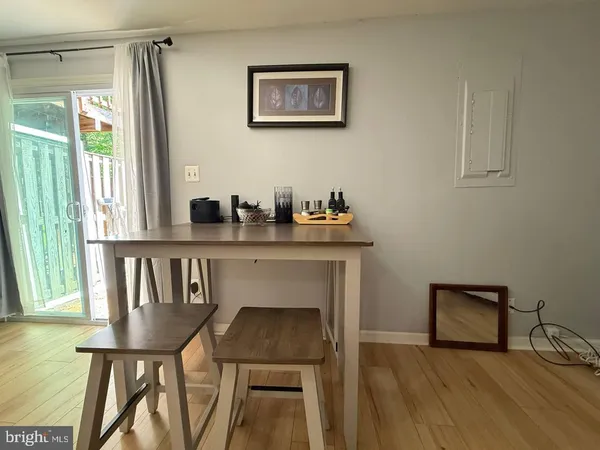 a view of a livingroom with furniture and window