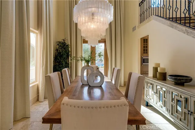 a large kitchen with kitchen island a sink and a stove