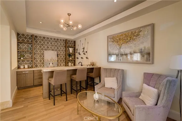 a living room with fireplace furniture and a flat screen tv