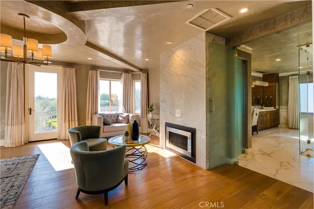 a view of a living room and kitchen