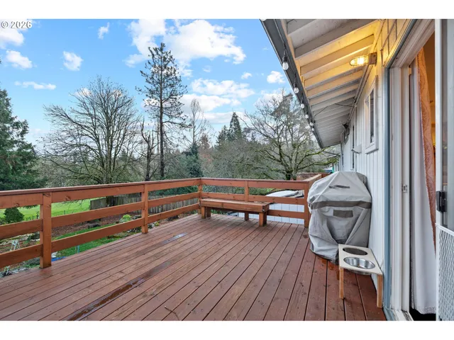 a view of a backyard with furniture