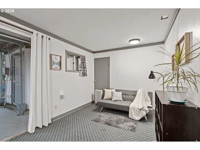 a room with lots of furniture and windows