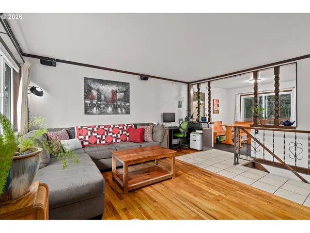 a view of living room with furniture and window