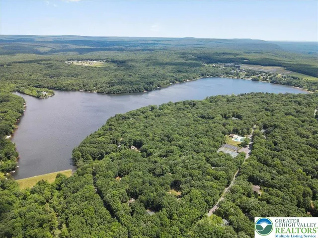 a view of a yard with an outdoor space