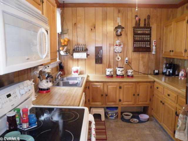 5808 West Rois Road Richmond, VA 23227 - Photo 3 of 11 Kitchen - Kitchen features older custom cabinets with extra counter space!