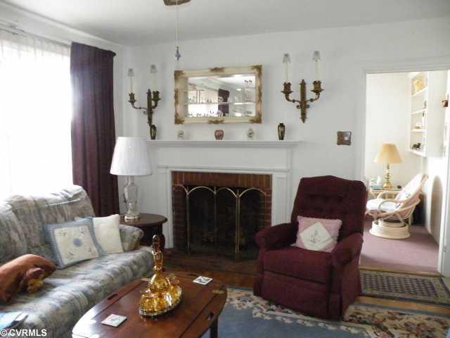 5808 West Rois Road Richmond, VA 23227 - Photo 7 of 11 Living Room - Hardwood floors, some under carpet, create charm