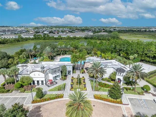a view of a chairs and table in the patio