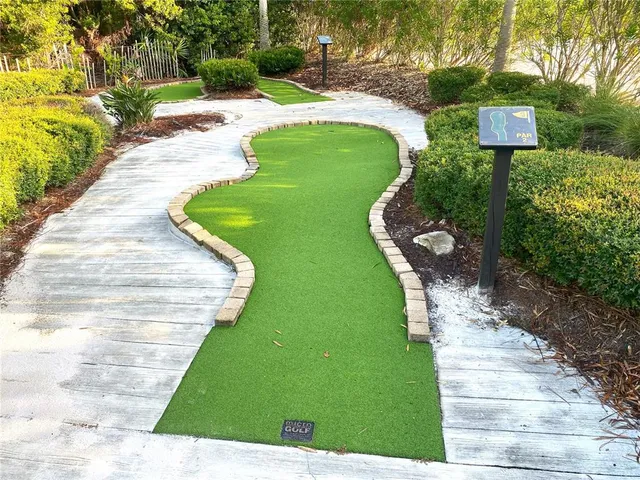 a view of a golf course with a garden