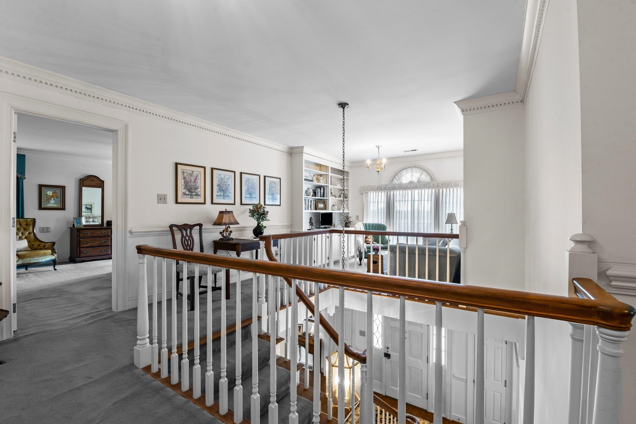 5101 Holly Ridge Farm Road Raleigh, NC 27616 - Photo 28 of 63 Front staircase leads up to the Loft on the second floor. Upstairs Landing