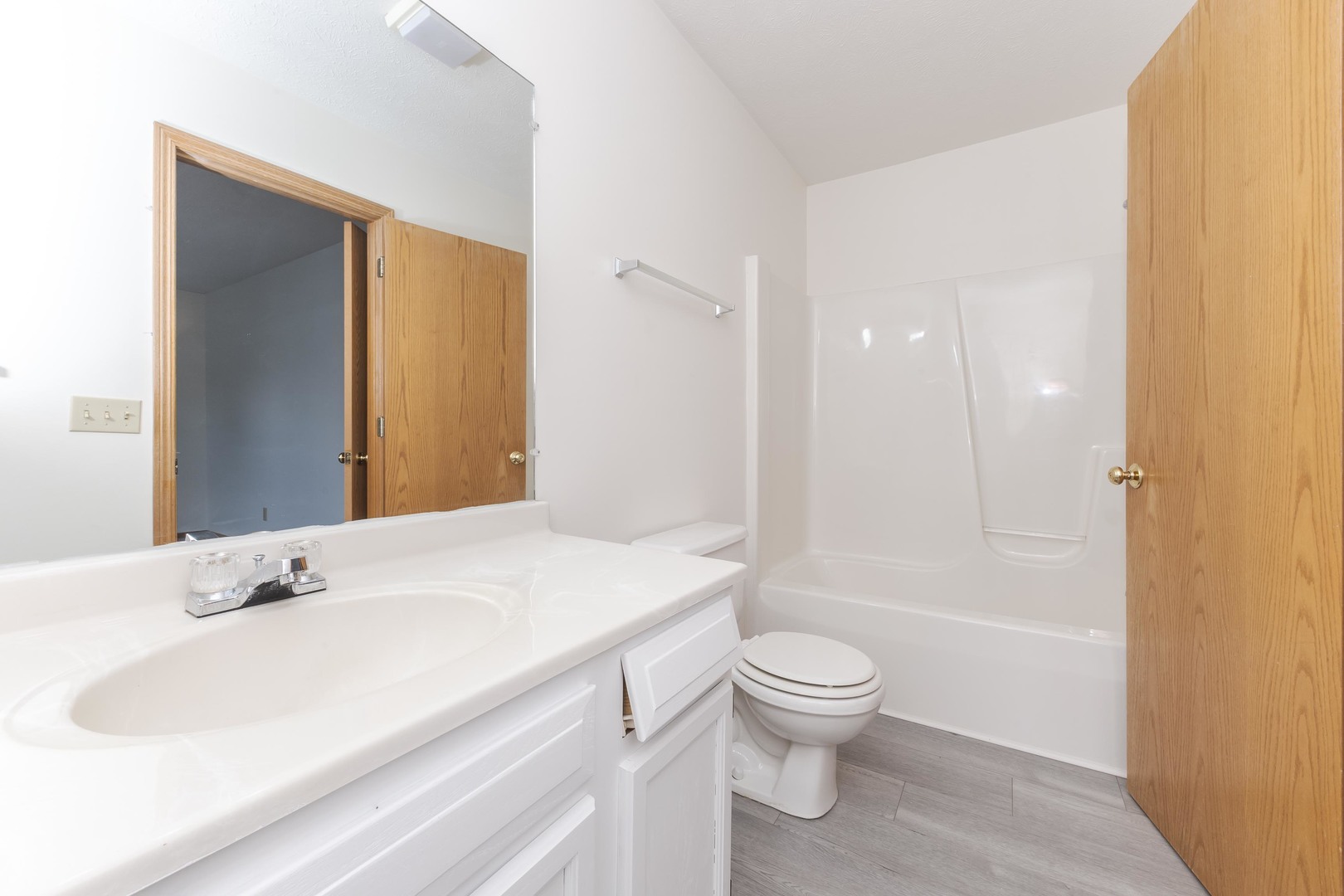 26 Vermont Avenue Bloomington, IL 61701 - Photo 21 of 37 a bathroom with a sink a toilet and shower