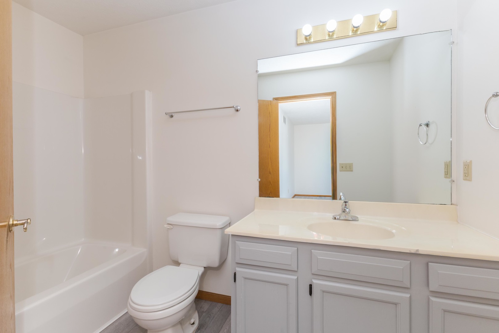 26 Vermont Avenue Bloomington, IL 61701 - Photo 24 of 37 a bathroom with a sink a toilet and shower