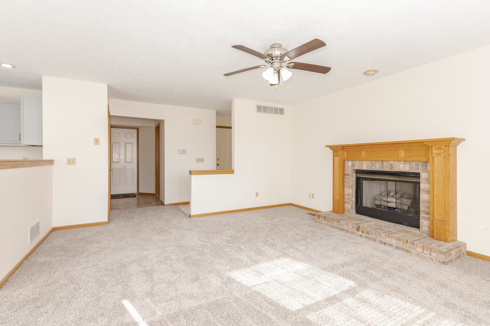 26 Vermont Avenue Bloomington, IL 61701 - Photo 5 of 37 a view of a livingroom with a fireplace