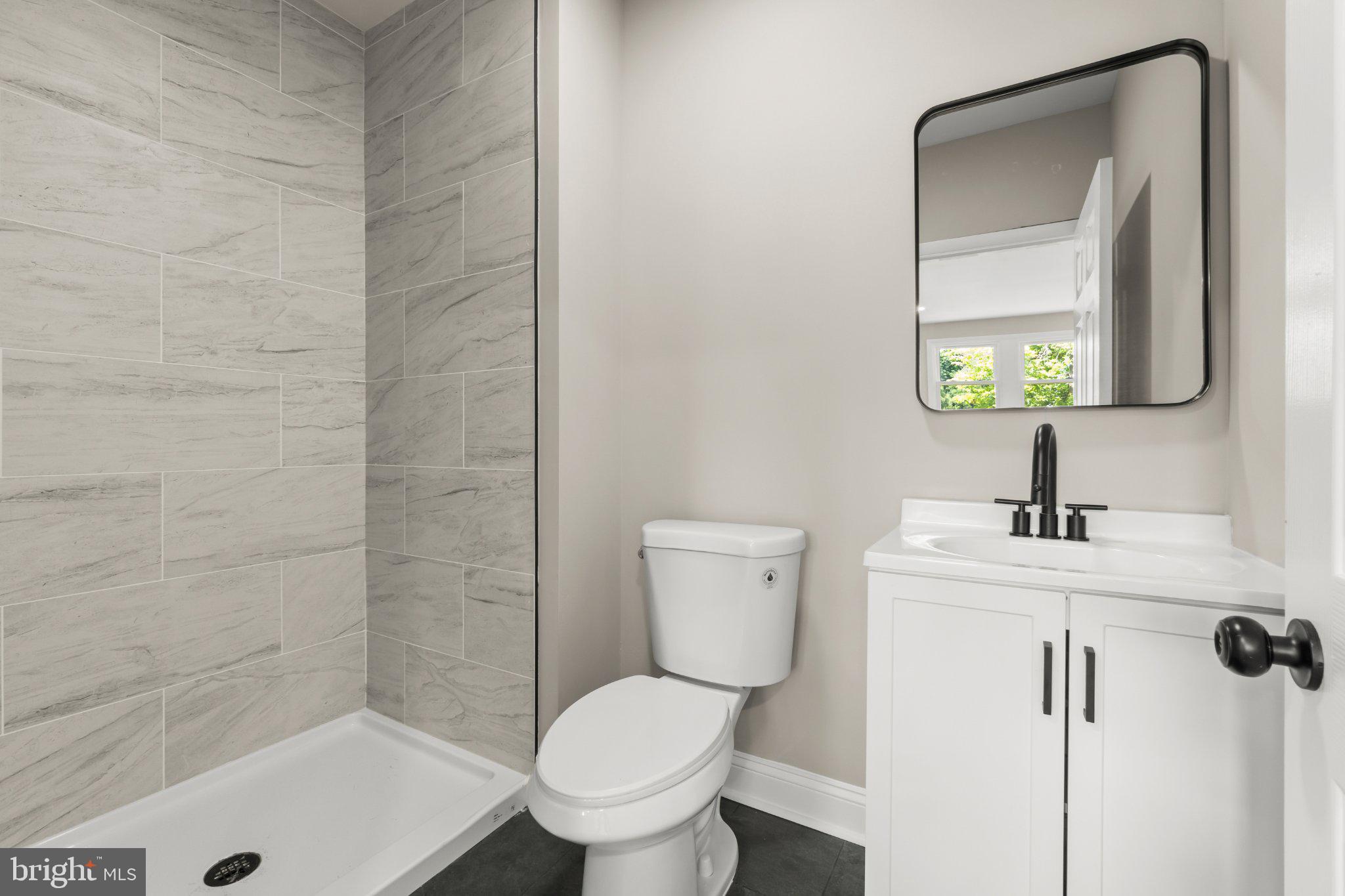 1551 South Main Road Vineland, NJ 08360 - Photo 11 of 24 Sleek modern bathroom with elegant finishes.