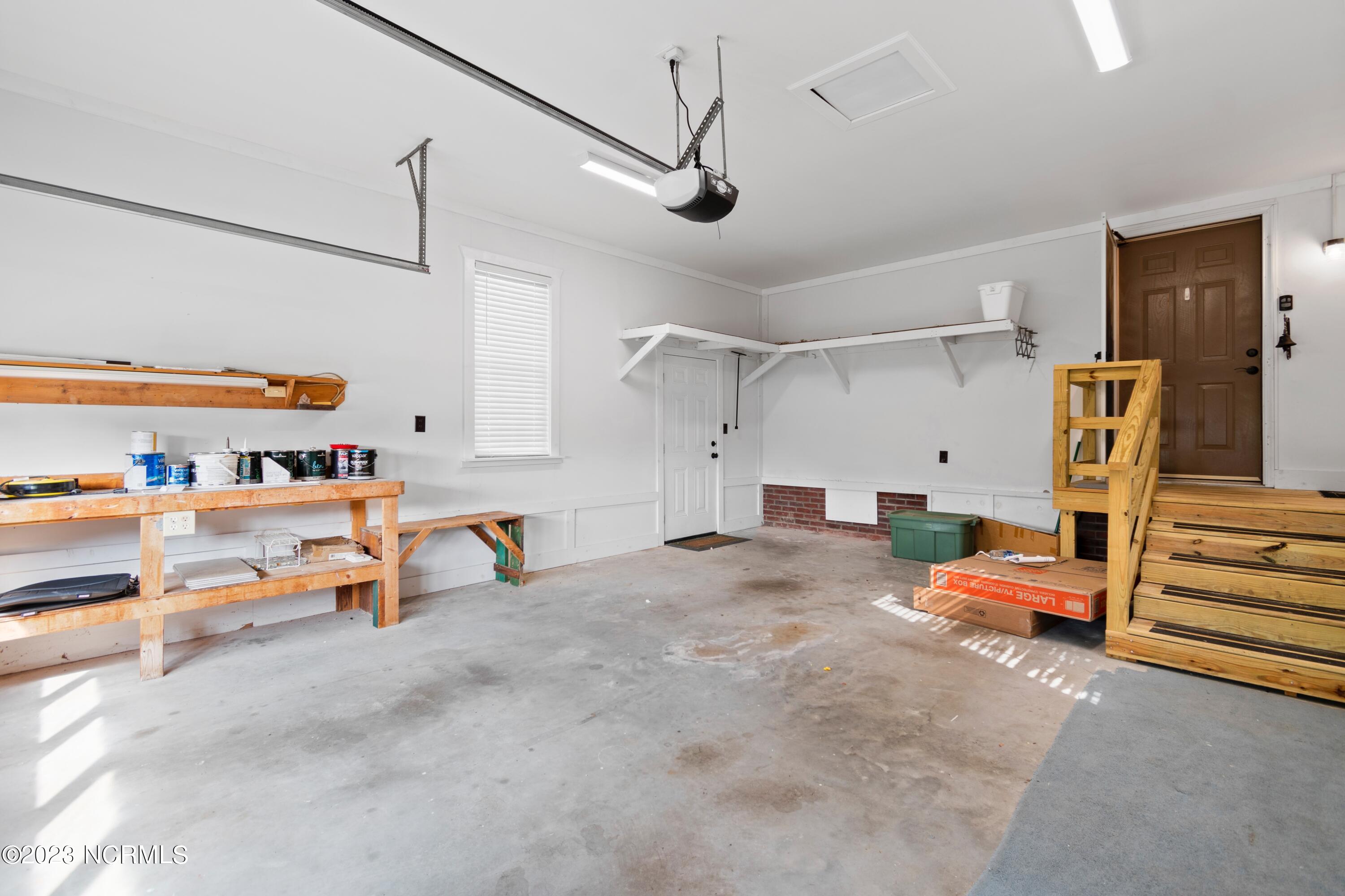 1014 Waterview Lane Southwest Calabash, NC 28467 - Photo 13 of 35 Garage with lots of work area