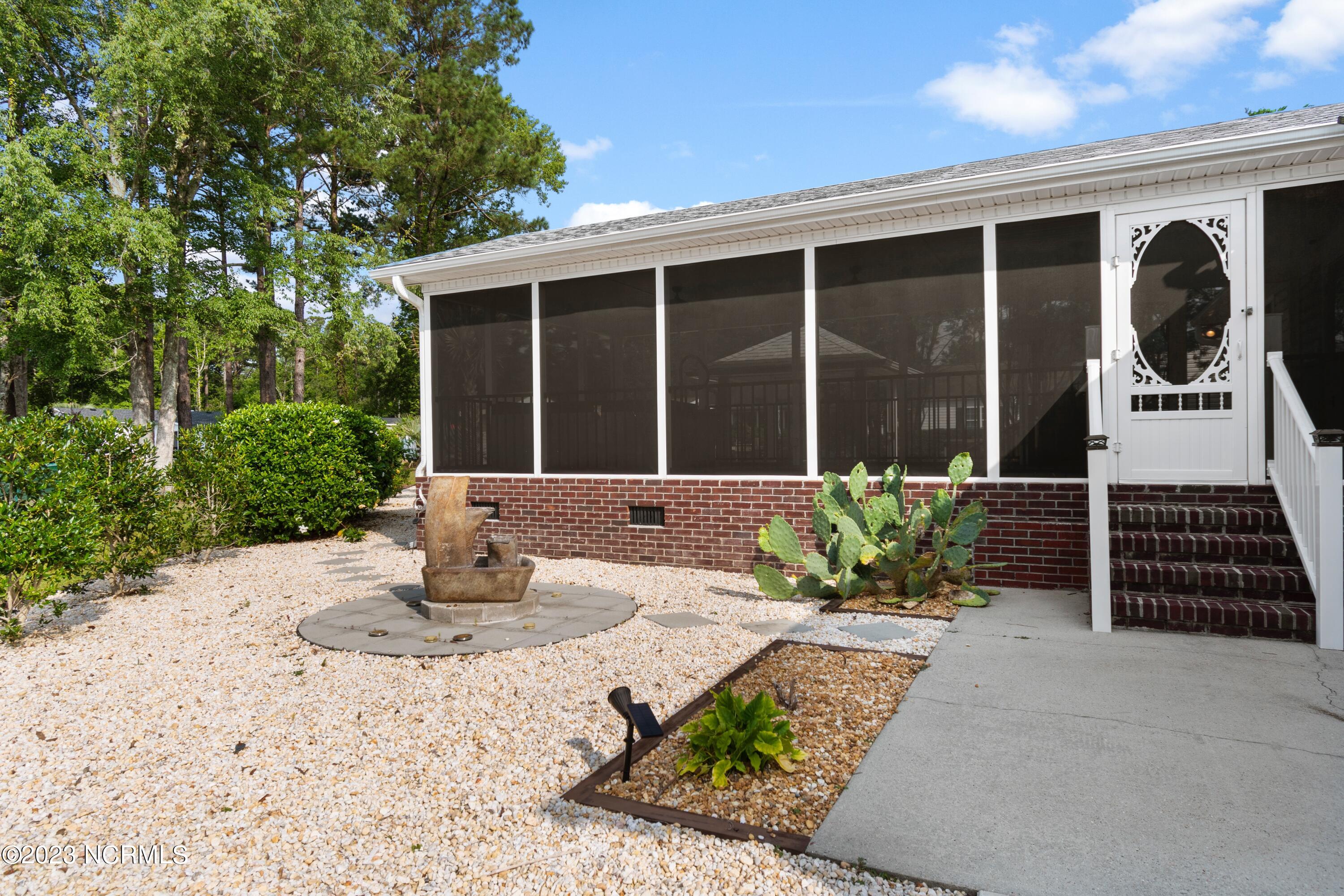 1014 Waterview Lane Southwest Calabash, NC 28467 - Photo 29 of 35 Screened in porch