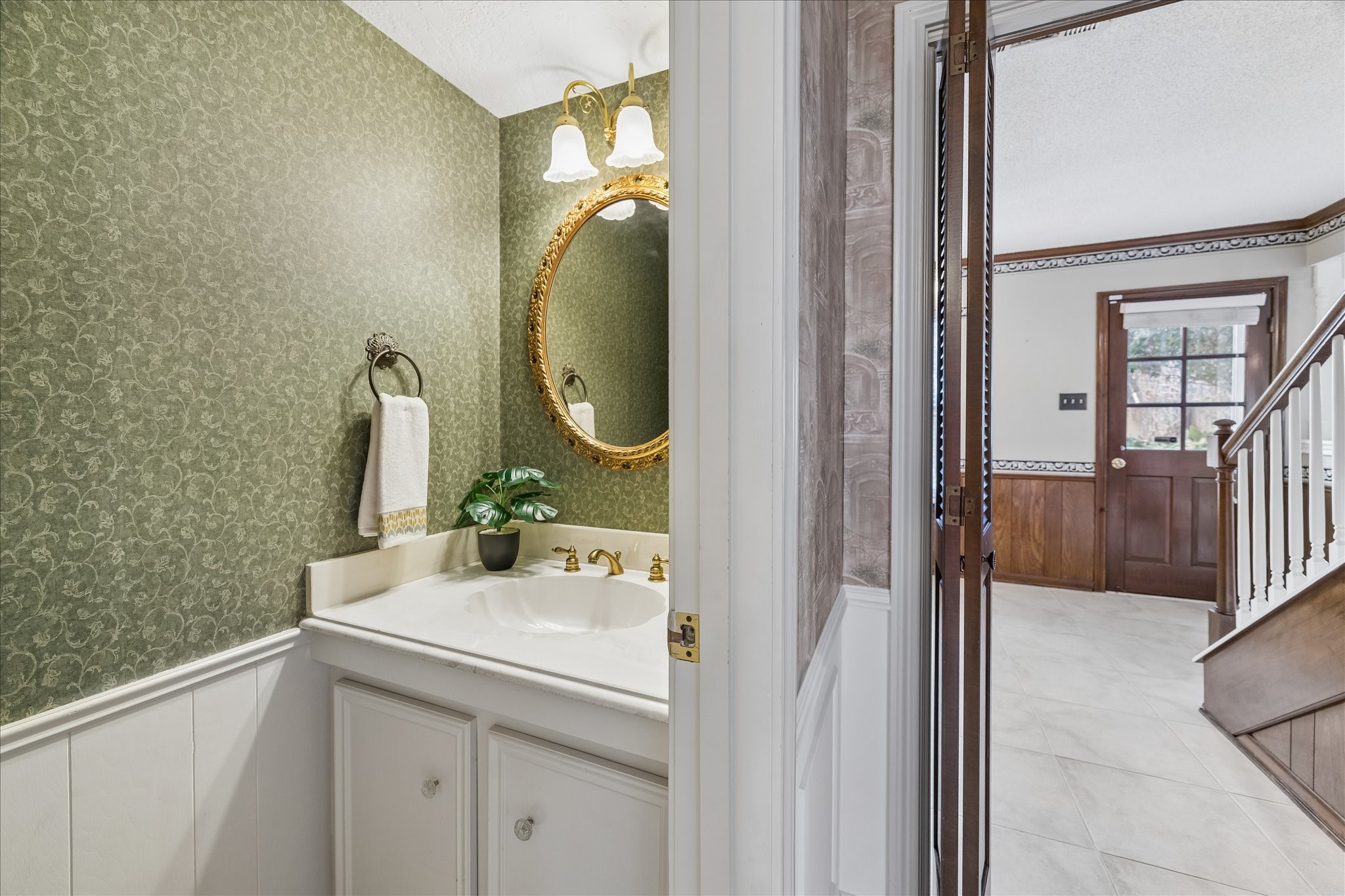 322 Enchanted River Drive Spring, TX 77388 - Photo 12 of 28 a bathroom with a sink and a mirror