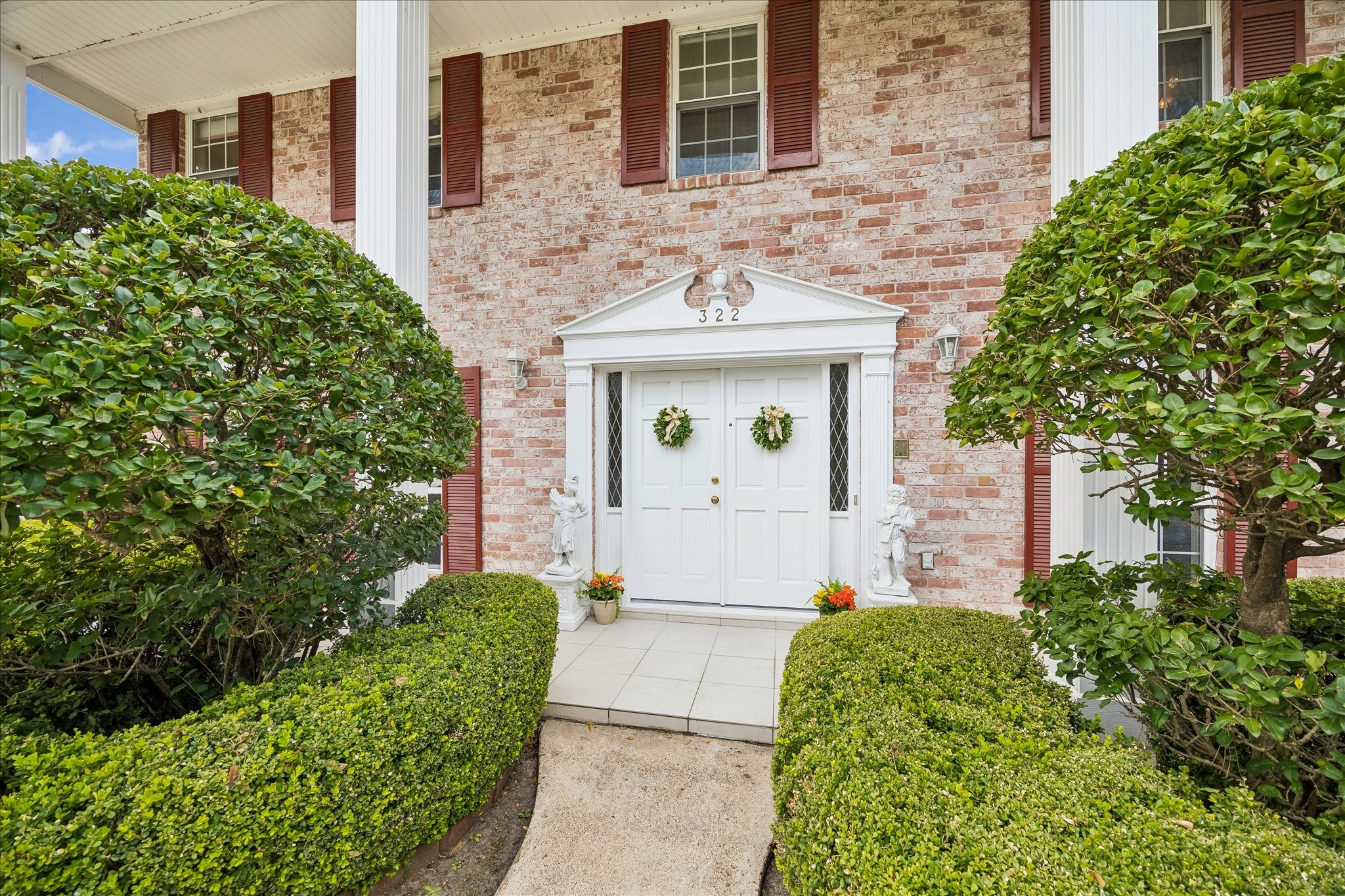 322 Enchanted River Drive Spring, TX 77388 - Photo 23 of 28 a front view of a house with garden