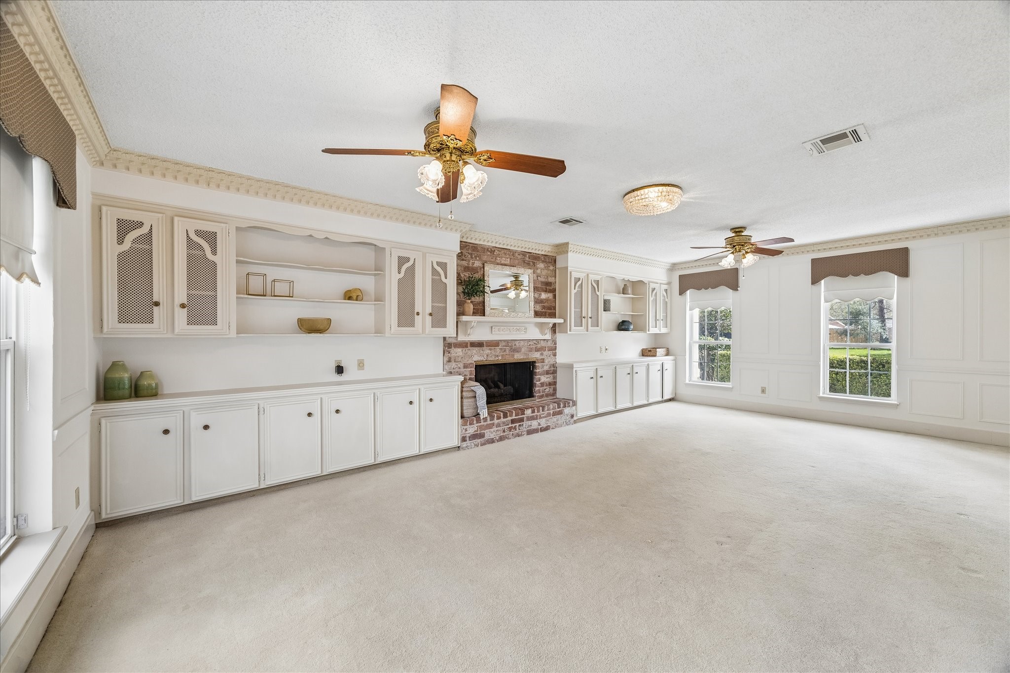 322 Enchanted River Drive Spring, TX 77388 - Photo 8 of 28 an empty room with windows and fireplace