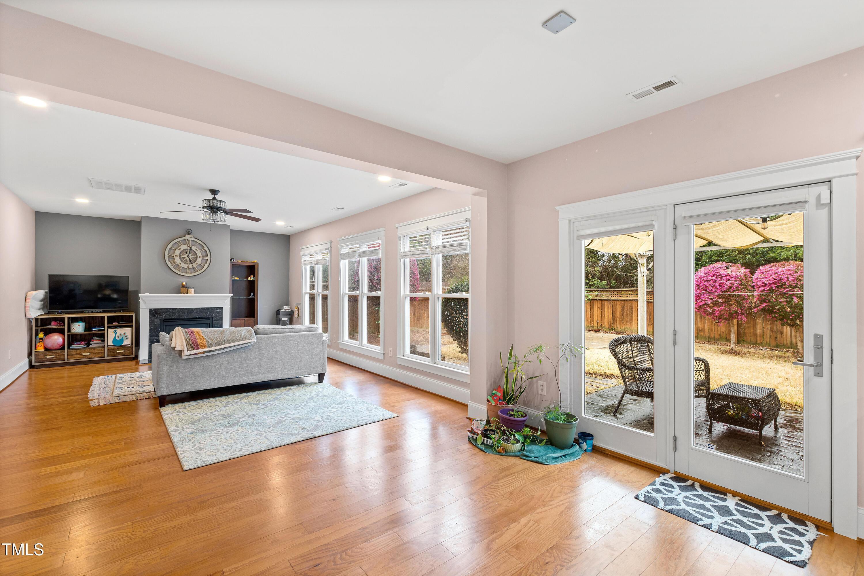 204 Frontgate Drive Cary, NC 27519 - Photo 17 of 41 a living room with furniture and a fireplace