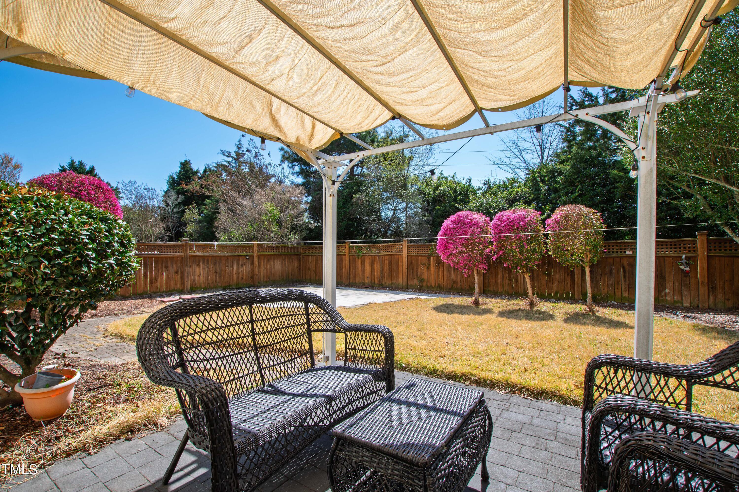 204 Frontgate Drive Cary, NC 27519 - Photo 41 of 41 a view of a chair and tables in the patio