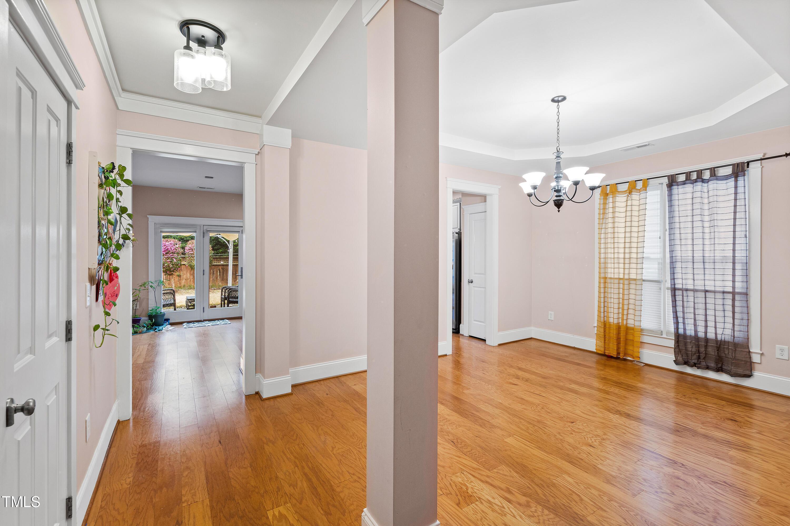 204 Frontgate Drive Cary, NC 27519 - Photo 8 of 41 wooden floor in an empty room with a window