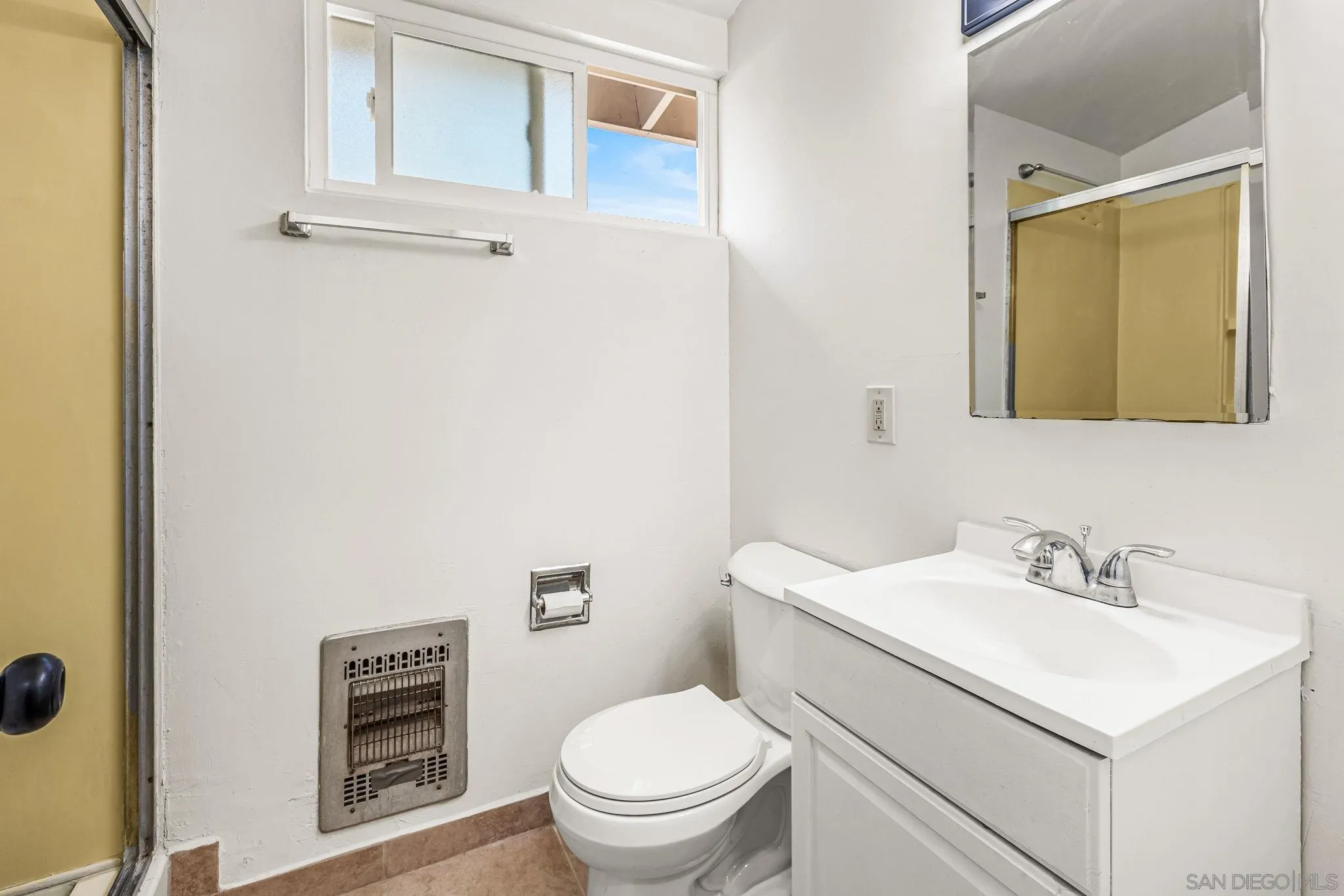 13323 Frame Road Poway, CA 92064 - Photo 11 of 30 a bathroom with a sink a toilet and a mirror
