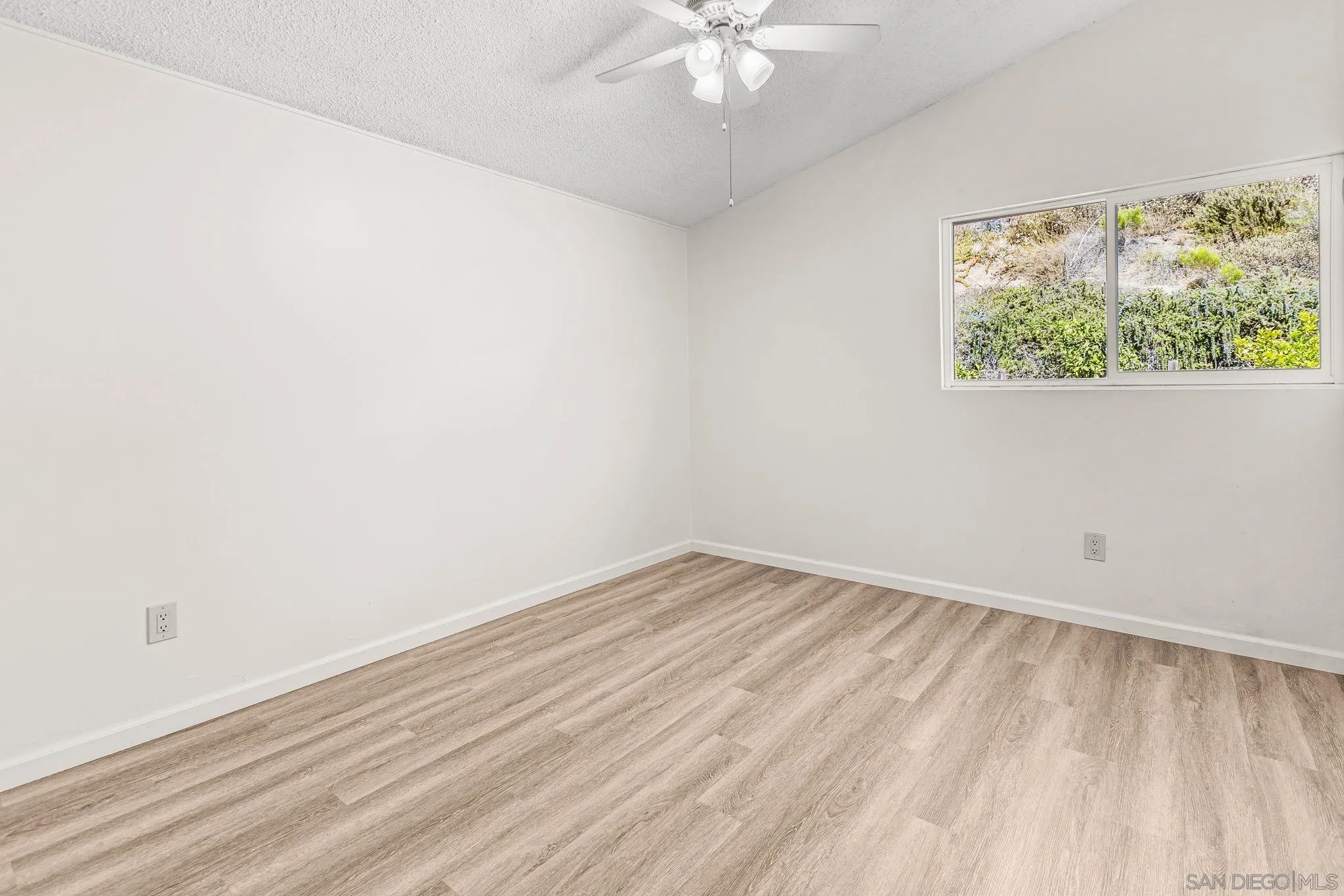 13323 Frame Road Poway, CA 92064 - Photo 12 of 30 an empty room with a window