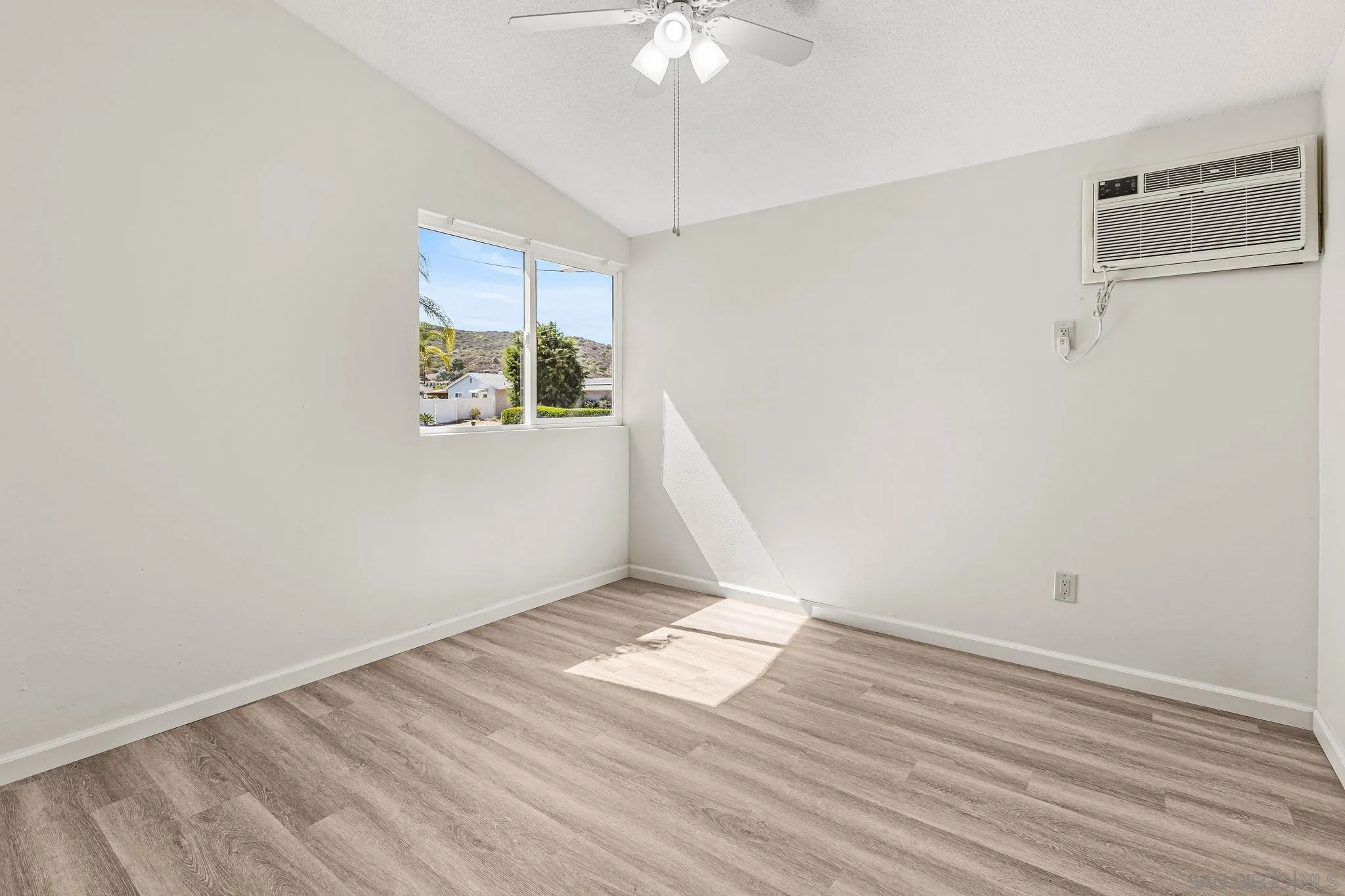 13323 Frame Road Poway, CA 92064 - Photo 15 of 30 a view of an empty room with a window