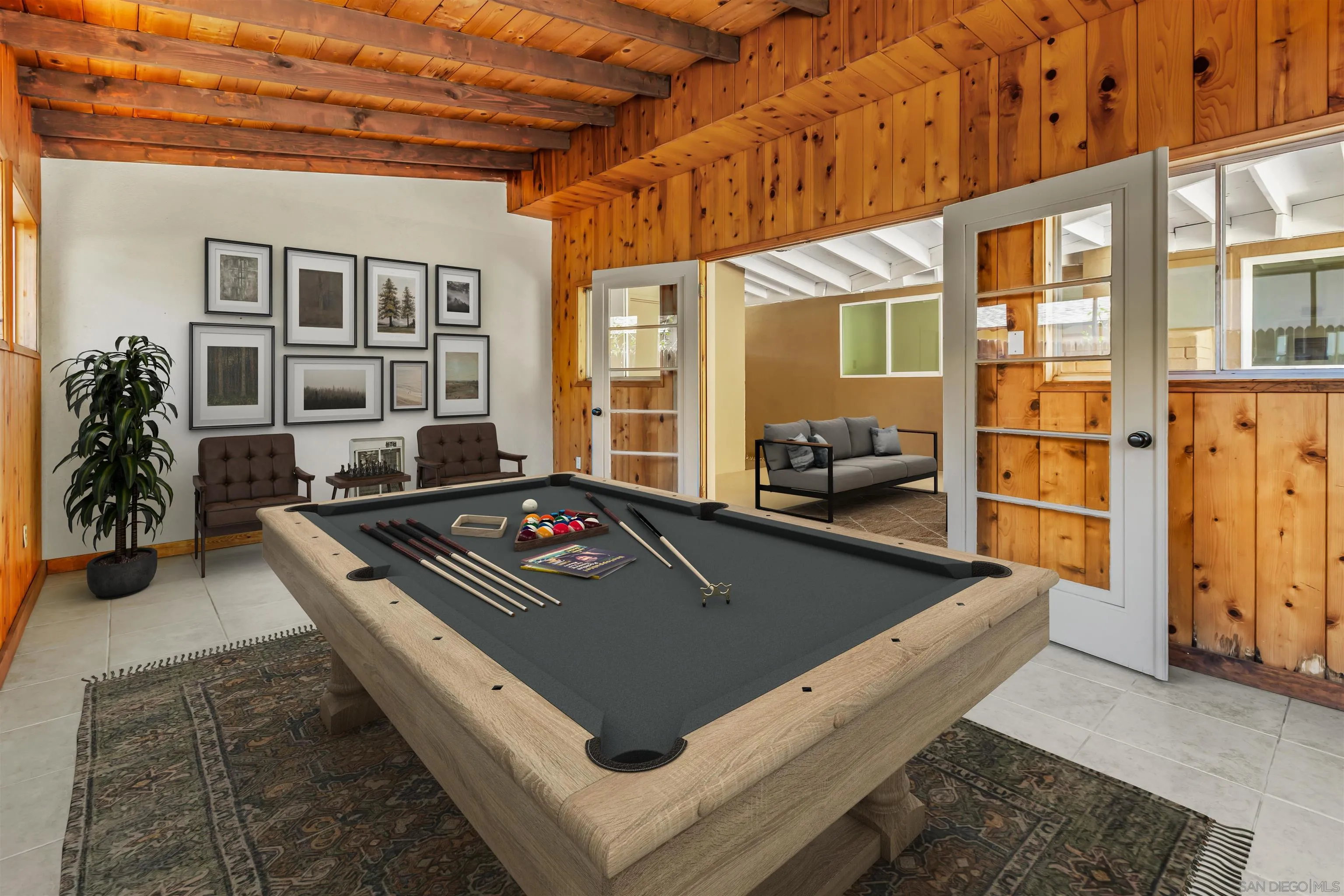 13323 Frame Road Poway, CA 92064 - Photo 16 of 30 a living room with furniture pool table and a large window