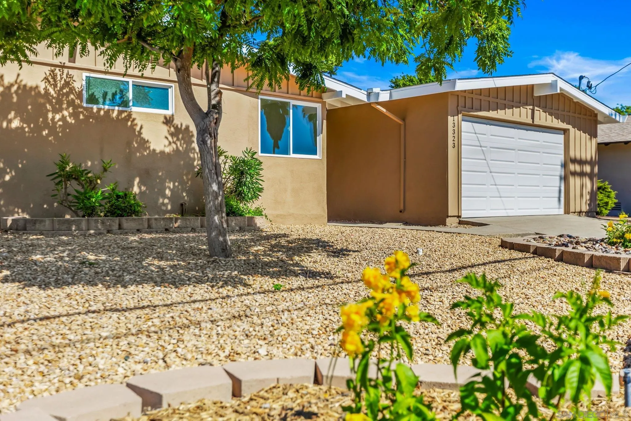 13323 Frame Road Poway, CA 92064 - Photo 19 of 30 a view of the house with a yard