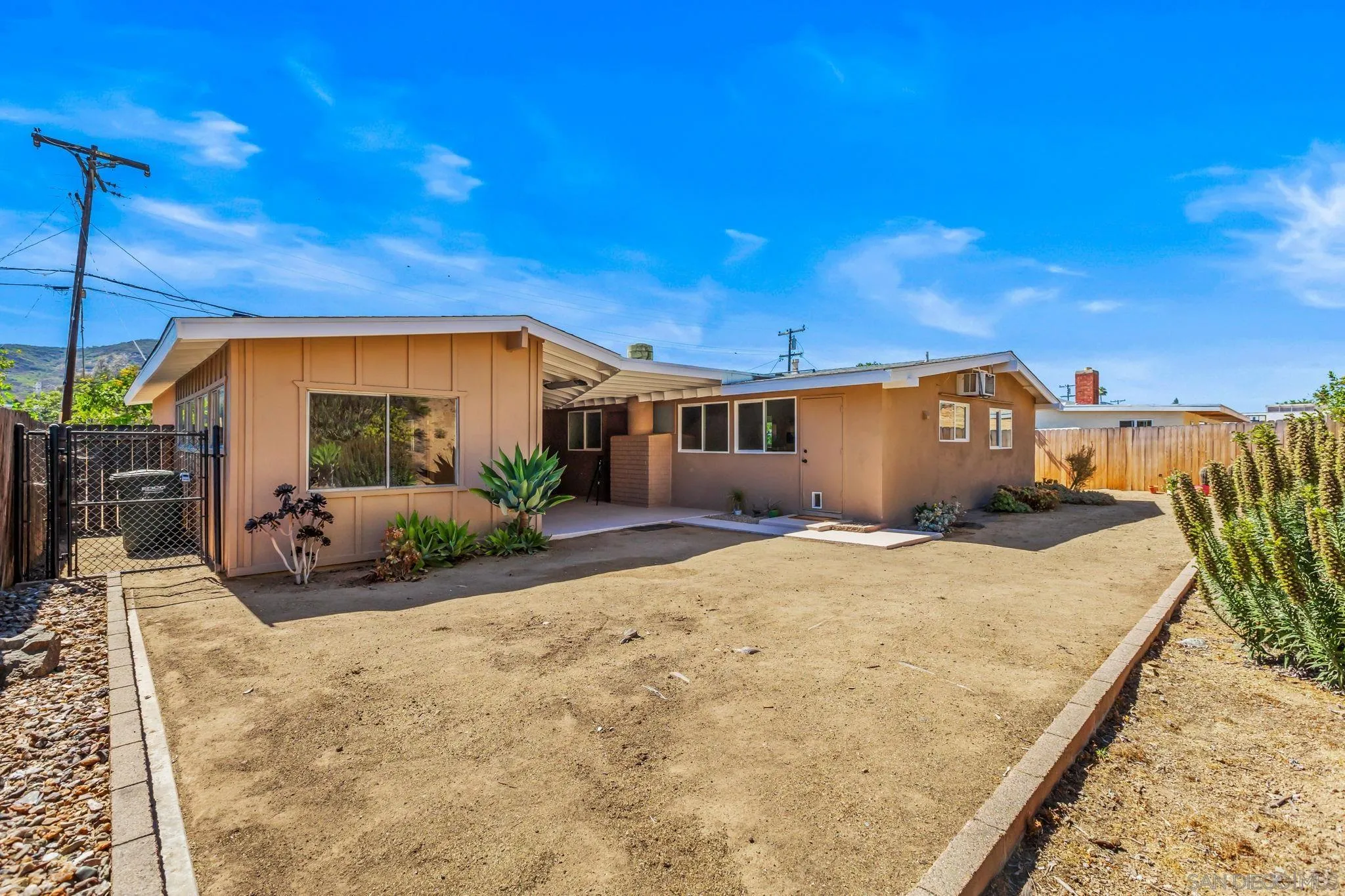 13323 Frame Road Poway, CA 92064 - Photo 21 of 30 a view of a house with a patio