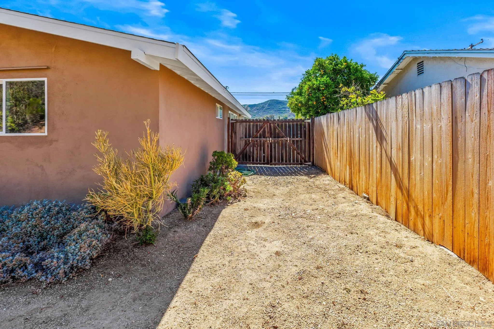 13323 Frame Road Poway, CA 92064 - Photo 29 of 30 a view of a backyard with pathway