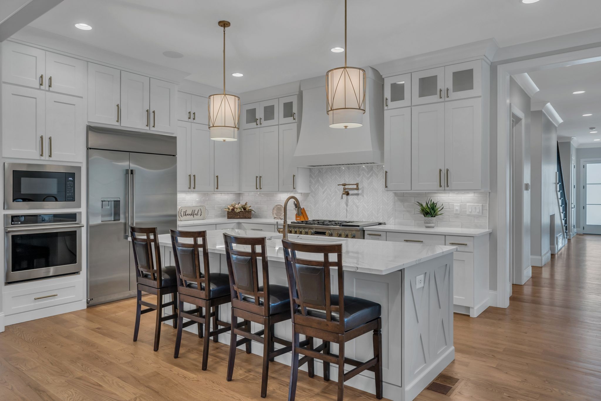 2836 Buford Lane Spring Hill, TN 37174 - Photo 12 of 41 a kitchen with stainless steel appliances kitchen island a chandelier and refrigerator
