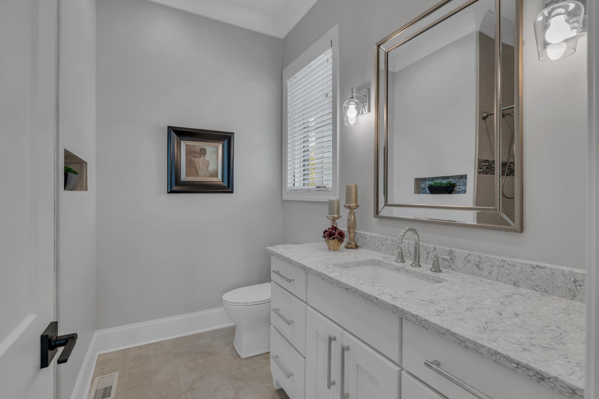 2836 Buford Lane Spring Hill, TN 37174 - Photo 22 of 41 a bathroom with a granite countertop sink a toilet and a mirror