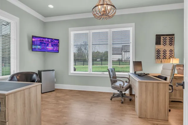 a work room with furniture and windows