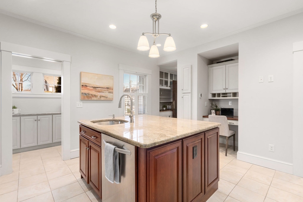 40 Hillcrest Road Belmont, MA 02478 - Photo 12 of 39 a kitchen with a stove and a refrigerator