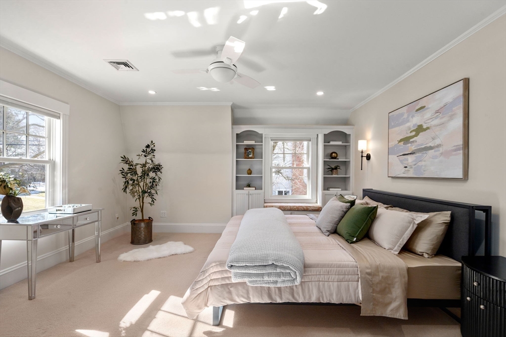 40 Hillcrest Road Belmont, MA 02478 - Photo 18 of 39 a spacious bedroom with a large bed and potted plant