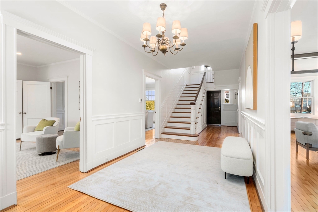 40 Hillcrest Road Belmont, MA 02478 - Photo 2 of 39 a living room with furniture and a chandelier