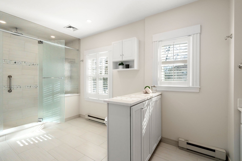 40 Hillcrest Road Belmont, MA 02478 - Photo 21 of 39 a bathroom with a sink a toilet and shower