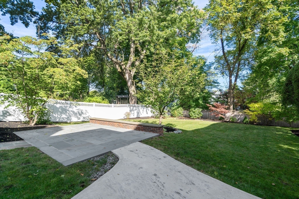 40 Hillcrest Road Belmont, MA 02478 - Photo 35 of 39 a view of a yard with plants and large trees