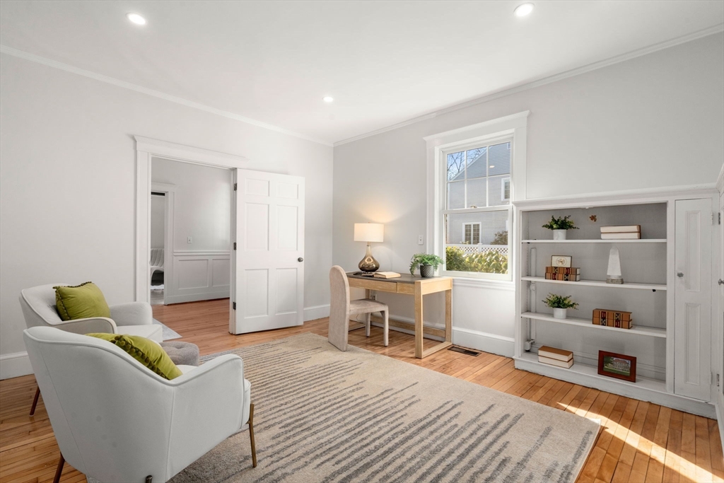 40 Hillcrest Road Belmont, MA 02478 - Photo 6 of 39 a living room with furniture and a book shelf