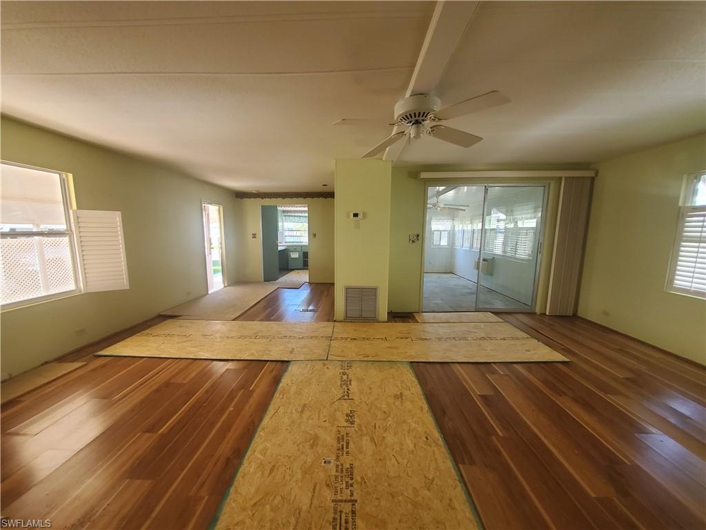 a view of livingroom with kitchen