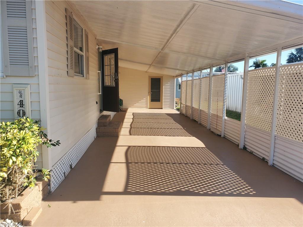 40 Enchanting Boulevard, Unit E40 Naples, FL 34112 - Photo 7 of 9 a black and white photo of a house