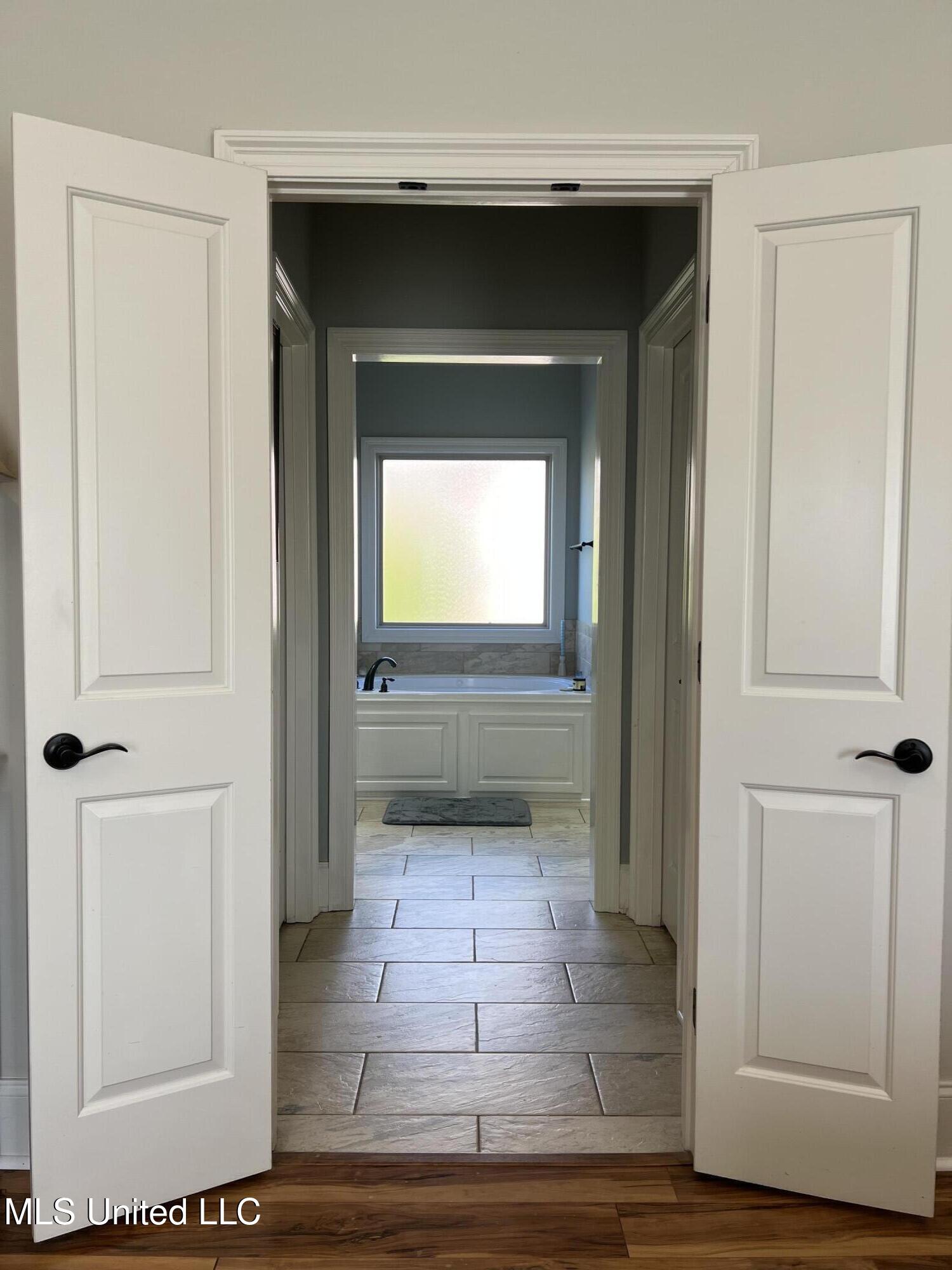 137 Camden Crossing Madison, MS 39110 - Photo 15 of 25 Closet/Bathroom