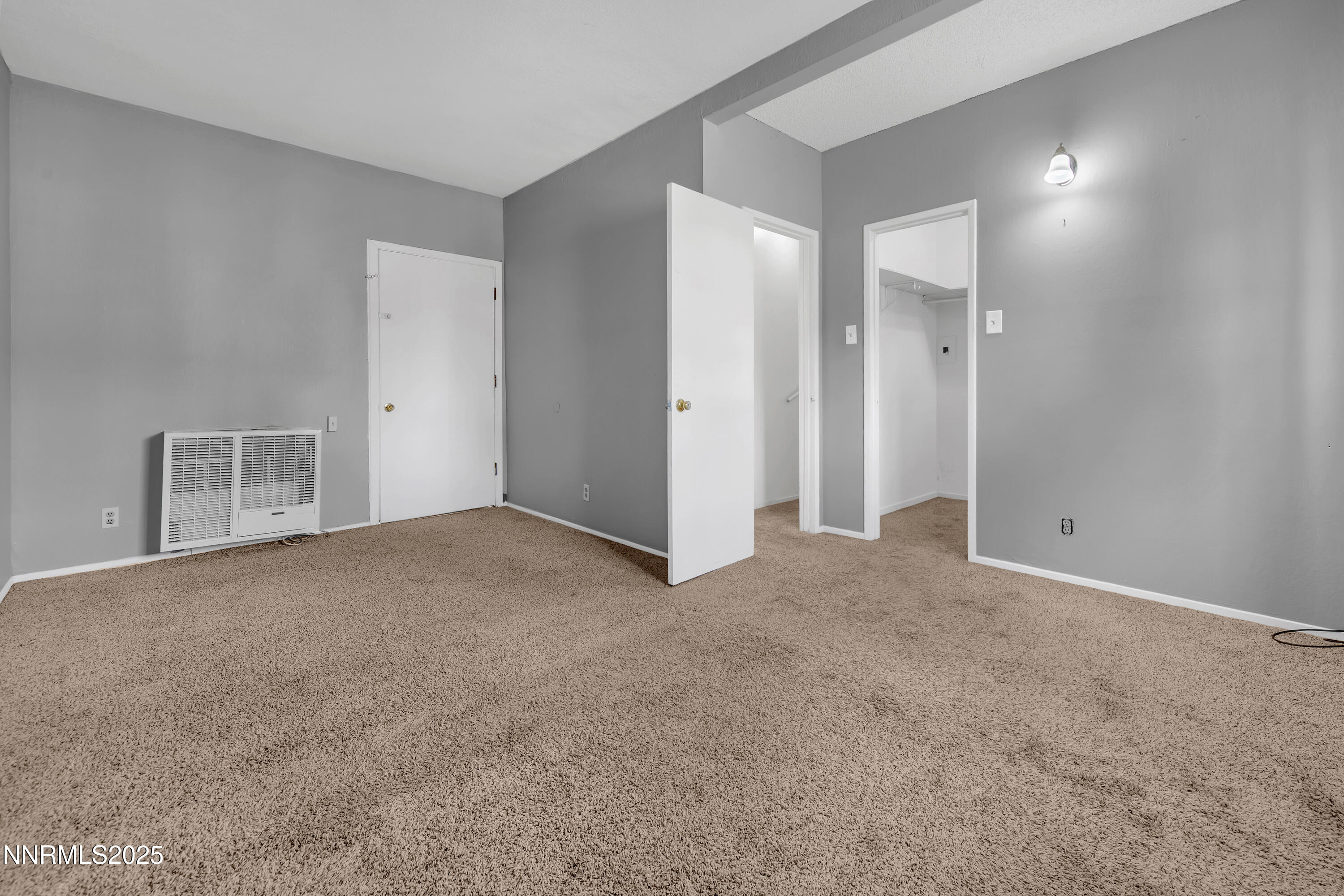 5760 Leon Drive Sun Valley, NV 89433 - Photo 17 of 42 a view of an empty room and closet area