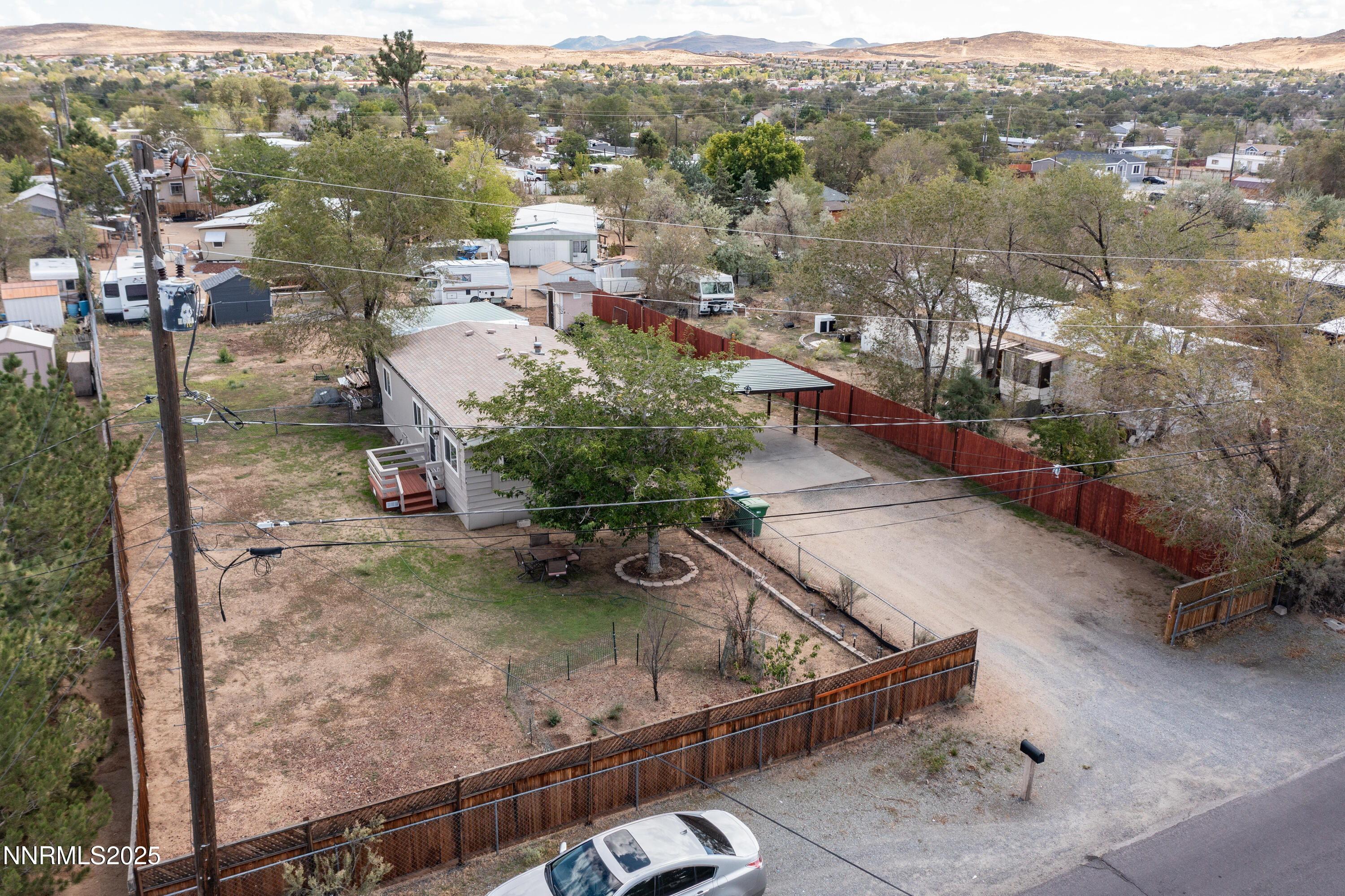 5760 Leon Drive Sun Valley, NV 89433 - Photo 2 of 42 a view of a house with a yard